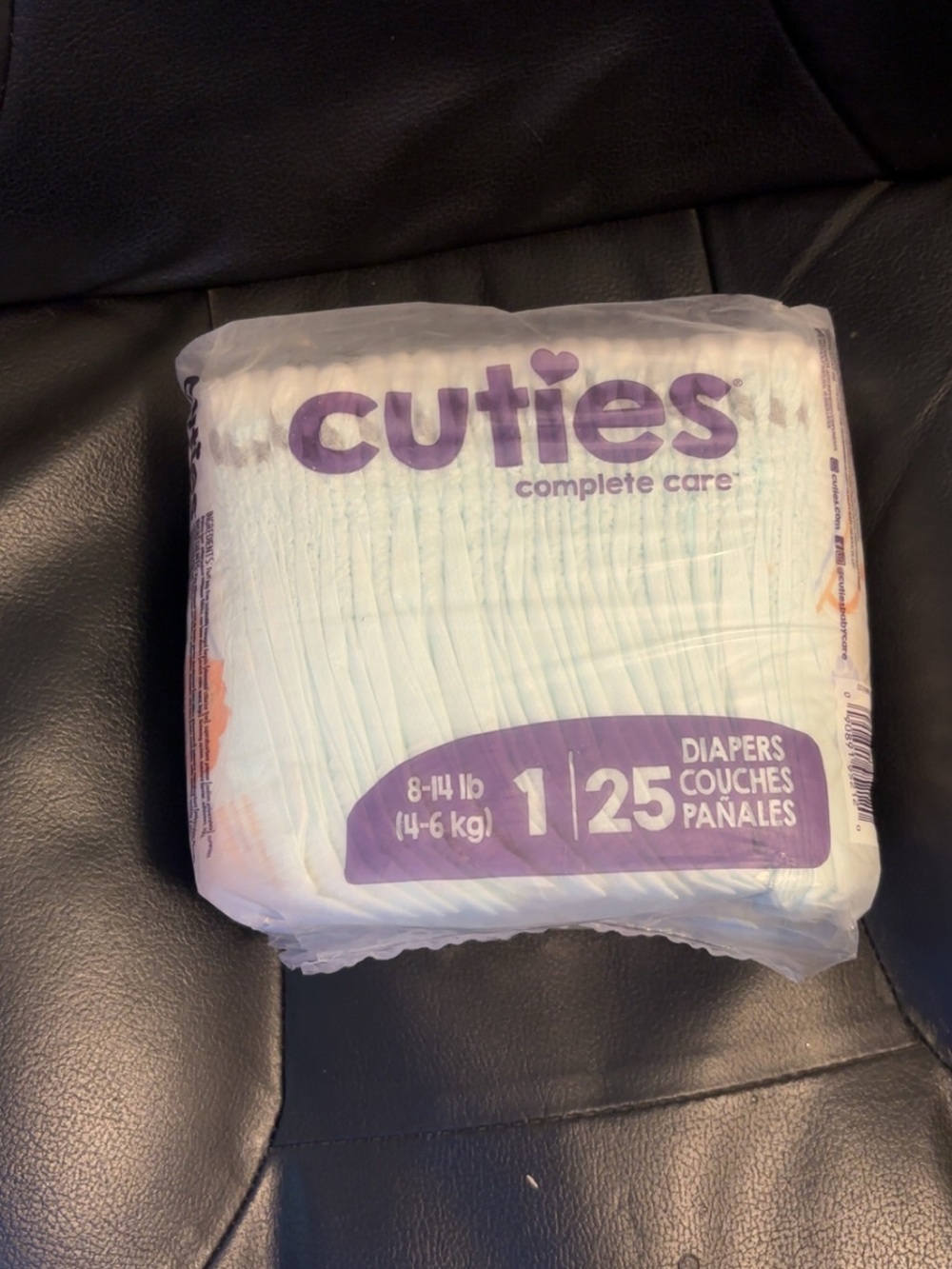 Cuties Complete Care Size 1 Baby Diapers - White & Purple (25 Count)